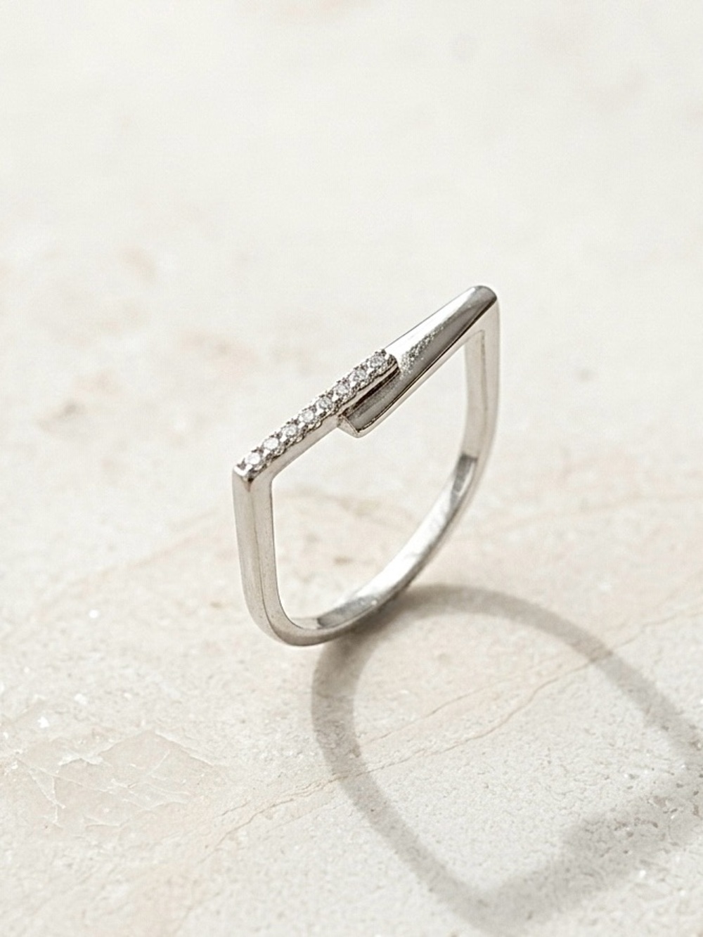 Platinum Plated Arrow Ring with Pavé CZ Accents | Geometric Silver Tone Ring